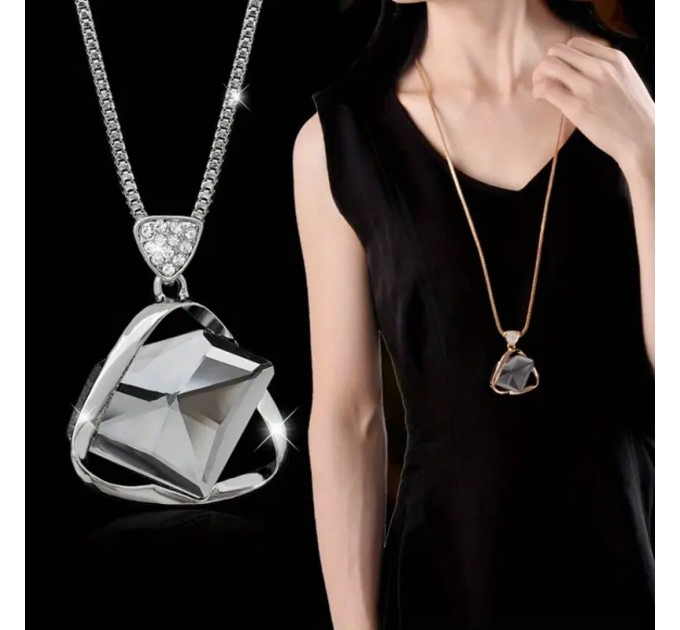 Жіночий довгий светр-ланцюжок з підвіскою