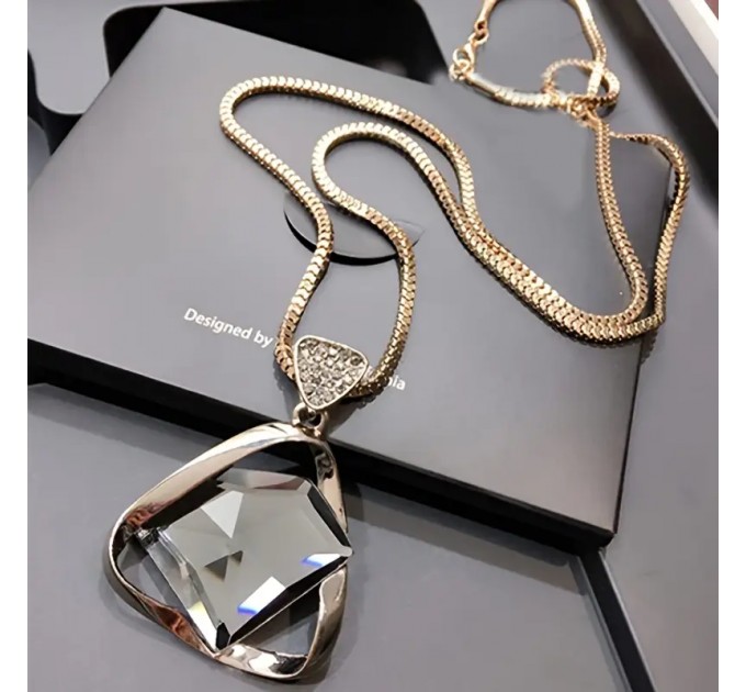 Жіночий довгий светр-ланцюжок з підвіскою