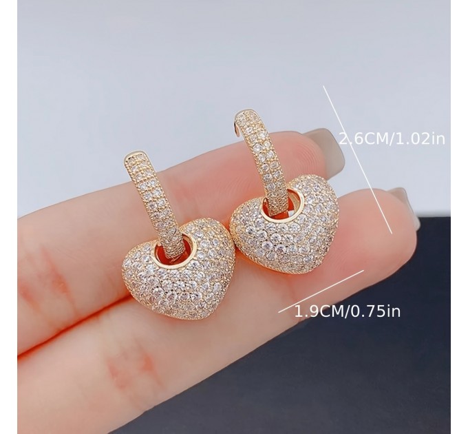 Розкішні золоті серцеві сережки з пряжкою