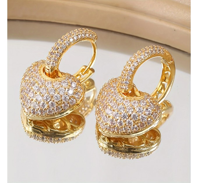 Розкішні золоті серцеві сережки з пряжкою