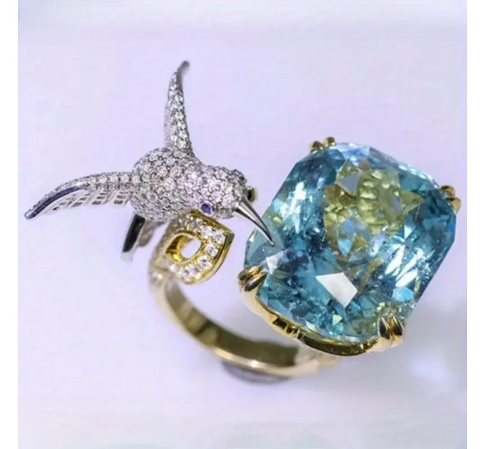 Розкішне кільце з блакитним аквамарином у формі колібрі