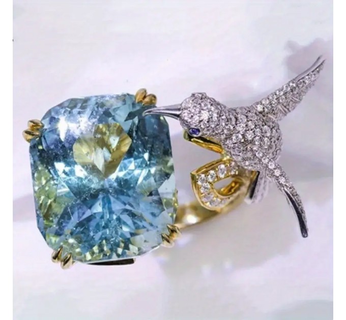 Розкішне кільце з блакитним аквамарином у формі колібрі