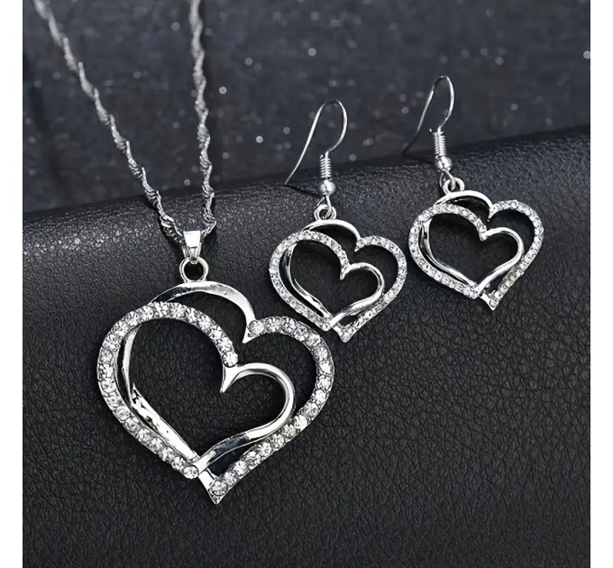 Елегантний набір з подвійним серцем-підвіскою та сережками