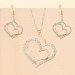 Елегантний набір з подвійним серцем-підвіскою та сережками