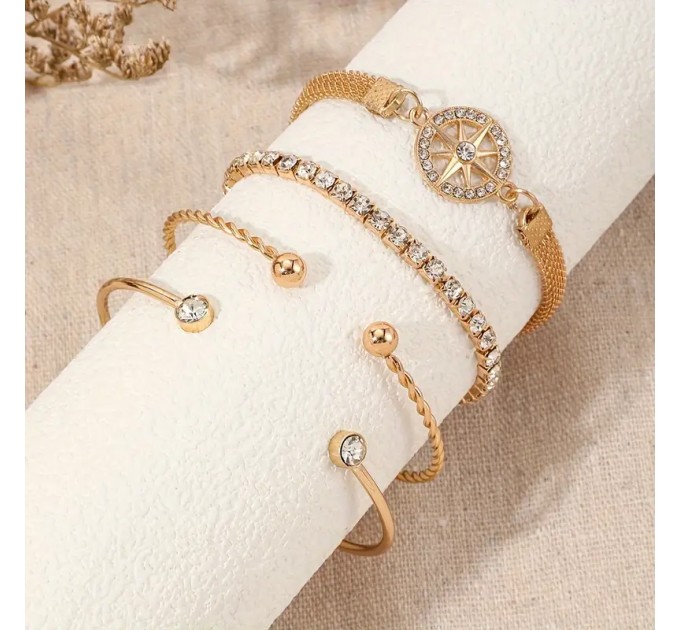 Елегантний набір з 4 браслетів зі стразами