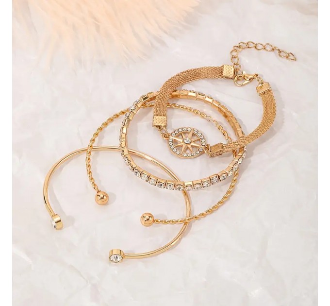 Елегантний набір з 4 браслетів зі стразами