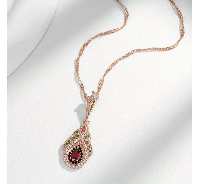 Золотий кольоровий кулон у формі серця