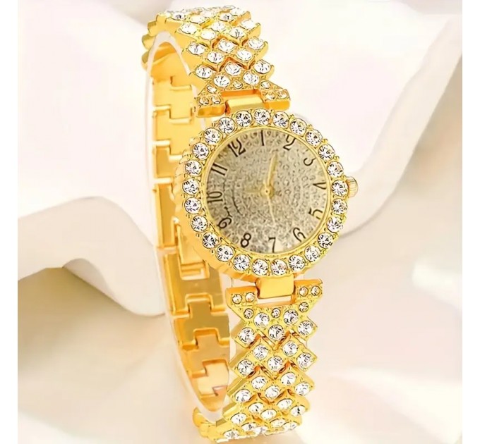 Елегантниий модний набір з годинника та аксесуарів.